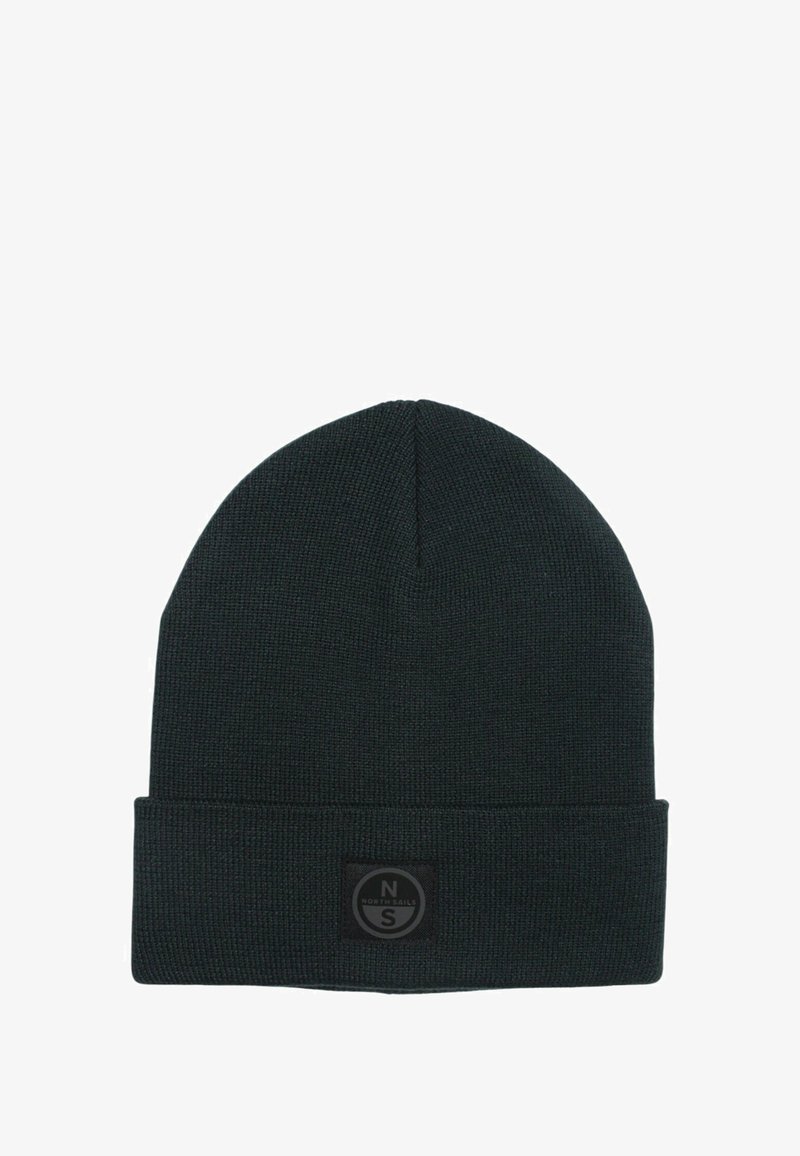 Bonnet en tricot noir avec un revers, arborant un patch logo noir rond au centre avec une lettre "N" et "S" blanches.