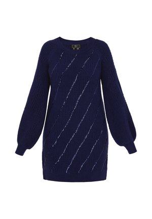 Vestido de punto de color navy con mangas largas y voluminosas y acentos metálicos diagonales. Patrón texturizado y escote redondo.