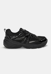 Black athletic shoe featuring a mesh upper, glossy accents, textured sole, and a padded collar with traditional lacing system.