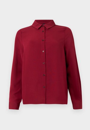 Red button-up shirt with a collar, long sleeves, and a textured fabric. Features dark buttons and a straight hem for a tailored look.