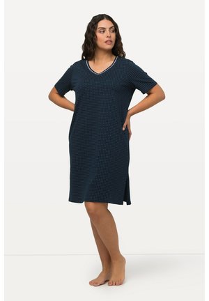 Vestido de manga corta azul marino con lunares blancos, escote en V, aberturas laterales y un corte relajado. Confeccionado en una tela suave para mayor comodidad.