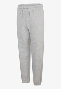 Pelēkie jogger bikses, kas izgatavotas no mīksta auduma ar elastīgu jostasvietu un aprocēm, ar baltu logotipu augšējā kreisajā kājā.