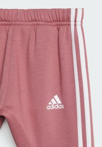 adidas Performance BADGE OF SPORT - Tuta - sandy pink/white