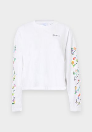 Λευκό κοντό μακρυμάνικο μπλουζάκι από βαμβάκι, με πολύχρωμα λουλουδένια σχέδια κατά μήκος των μανικιών και ένα μικρό λογότυπο στο μπροστινό μέρος.