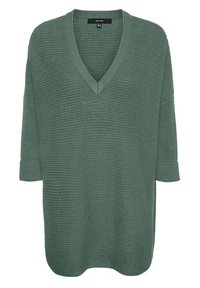 Oversized green sweater with a V-neck, textured knit fabric, three-quarter sleeves, and rolled cuffs. Simple design, no patterns or accents.