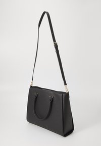 Black faux leather handbag with two top handles and an adjustable shoulder strap. Features gold-tone hardware and a structured design.
