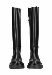 Bottes noires montantes en cuir lisse avec un bout rond et des semelles en caoutchouc épaisses. Dotées d'une fermeture éclair latérale pour un enfilage facile.