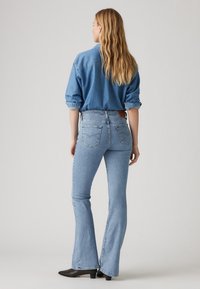 Levi's® 726™ HIGH RISE FLARE - Flared Jeans - blue wave light
