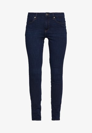 Dunkelblaue Skinny Jeans aus Denim, mit einem Reißverschluss, Vorder- und Hintertaschen sowie dezenten Nähdetails.