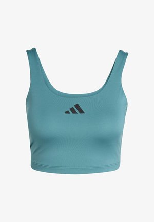 Teal crop top made of smooth, stretchy fabric. Features a round neckline and wide straps. Black Adidas logo prominently displayed on chest.