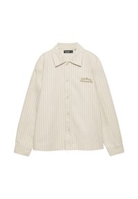 Chemise couleur crème à rayures verticales, boutonnée sur le devant, avec col, et broderie "Northern Community" en marron sur la poitrine gauche.