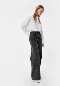 Koton WIDE LEG - Leveälahkeiset - black
