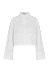 Chemise blanche recadrée avec un col mao, ornée de broderies décoratives et de fermetures à boutons sur le devant et aux poignets. Texture lisse.