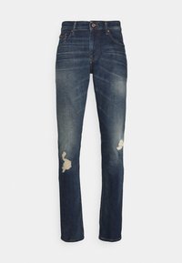 Tmavě modré džíny z denimu s roztrženými detaily na kolenou, rovný střih a klasický design s pěti kapsami a zapínáním na knoflík.