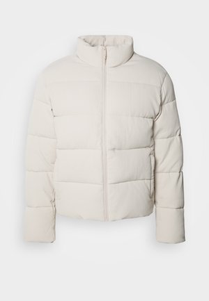 Cream-colored puffer jacket with a high collar, horizontal stitch pattern, front zipper, and slightly cropped sleeves. Water-resistant material.