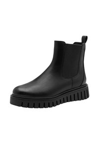 Bottes Chelsea en cuir noir avec des panneaux élastiques latéraux, une languette de traction et une semelle épaisse à côtes. Texture lisse avec un minimum de détails.