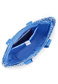 Blå mønstret tote bag med lynlås, en glat inderside med lommer og to stærke håndtag for nem bæring.