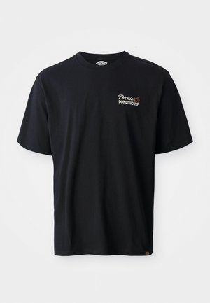 Schwarzes Baumwoll-T-Shirt mit kurzen Ärmeln. Verfügt über ein gesticktes Logo "Dickies Donut House" im linken Brustbereich. Klassisches Rundhaldesign.