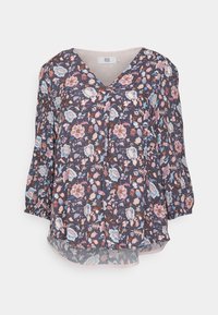 Blusa a maniche lunghe con scollo a V e polsini elasticizzati, con uno sfondo scuro e un motivo floreale nei toni del rosa, blu e marrone.