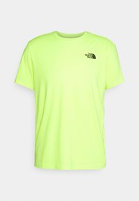 Neongelbes T-Shirt mit kurzen Ärmeln aus weicher Baumwolle. Verfügt über ein schwarzes Logo auf der linken Brust. Rundhalsausschnitt und lockere Passform.