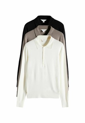 Tre långärmade pikétröjor staplade: vit (framsidan), beige (mitten), svart (baksidan). Mjukt stickat material med klassisk krage och knäppning.