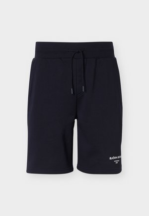 Shorts noirs mi-longues avec taille à cordon et poches avant, avec texte blanc "BJÖRN BORG" sur la jambe gauche.