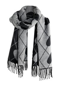 Gray and black scarf featuring a diamond pattern with heart shapes and fringed edges. Made of a soft, textured fabric.