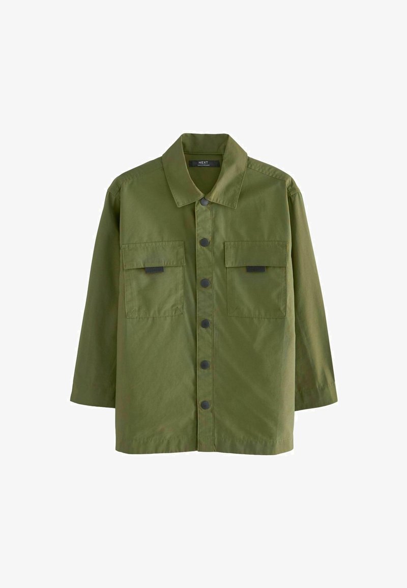 Veste en coton vert avec col, fermeture à boutons, deux poches avant et manches longues. Remarquable par sa texture mate et son design structuré.