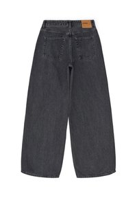 Black denim wide-leg pants with a high waist, two back pockets, and a tan leather label at the waistband. Smooth, medium-weight texture.