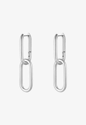 Srebrne metalne naušnice s produženim povezanim ovalnim oblicima s poliranim završetkom. Jednostavan dizajn bez dodatnih ukrasa.