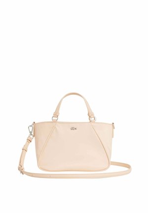 Sac à main en cuir beige avec deux petites poignées, une longue bandoulière amovible et un petit logo crocodile en métal au centre avant.