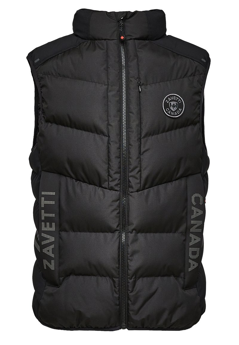 Gilet rembourré noir avec col haut, fermeture éclair sur le devant et logo sur la poitrine. Comprend des poches latérales et un texte réfléchissant "ZAVETTI" et "CANADA."