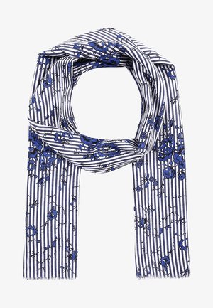 Witte sjaal met verticale marineblauwe strepen en blauw bloemenpatroon, losjes omgeslagen met franjes aan de randen.