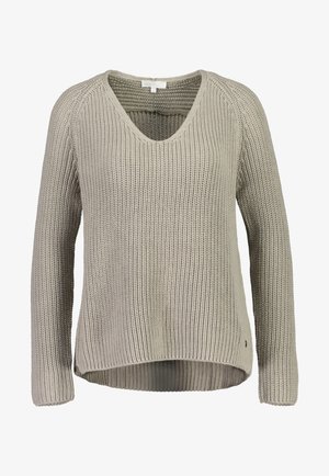 Vaaleanharmaa neulottu villapaita, jossa on V-aukko, pitkät hihat, ribbineulos ja hieman pidempi takahelma. Pienillä ompelusomistuksilla.