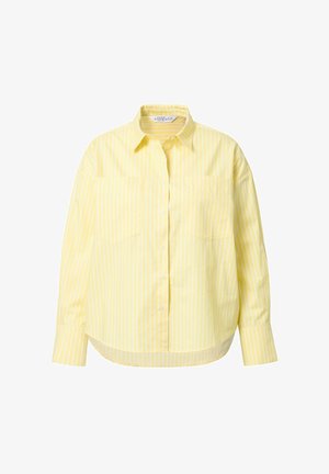 Gul skjorte med knapper og hvide vertikale striber, med krave og to frontlommer. Lavet af blødt, letvægtsstof med en afslappet pasform.