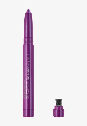 Lila Lidschatten-Stick mit zylindrischem Design, metallischer Oberfläche und konischer Spitze. Beinhaltet eine kleine schwarze Anspitzerkappe.
