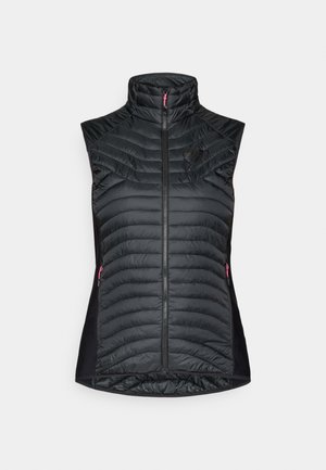 Μαύρο αμάνικο γιλέκο με όρθιο γιακά, καπιτονέ σχέδιο και αντίθετους ροζ φερμουάρ. Στενή εφαρμογή, ελαστικό στα πλάγια για άνεση.