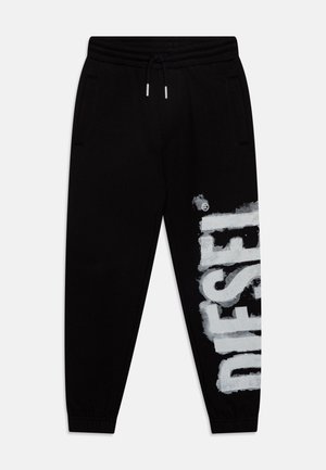 Zwarte sweatpants hebben een elastische tailleband met een trekkoord, zijzakken en een grote grijze grafische print van het woord "DIESEL" op één been.