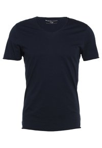 Marinblå kortärmad T-shirt i mjuk bomull, med en klassisk V-ringning och en enfärgad yta utan synliga mönster.