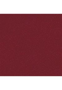 Tapis rouge foncé avec de petites taches roses et bleues éparpillées, offrant un aspect texturé.