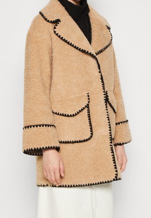 Halflange jas - beige