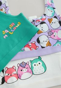 Színes gyerek haspólók halmaza, aranyos állat- és unikornis mintákkal, valamint "Squish Mallows" felirattal egy zöld pólón.