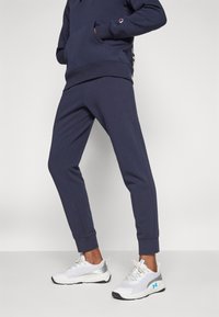 Champion ICONS RIB CUFF PANTS  - Spodnji deli trenirk - dark blue
