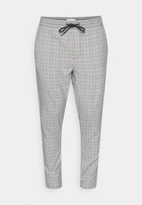 Šedé kostkované kalhoty s pasem na šňůrku, s jemným károvaným vzorem a zúženými nohavicemi. Vyrobené z měkké, lehké látky.
