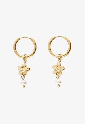 Gold hoop earrings with dangling gold flower charms and small white pearl pendants below the flowers on a white background.