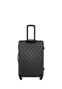 Valise noire à roues avec un motif en diamant, coque rigide, poignée rétractable et quatre roues pour la mobilité.