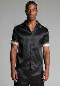 RESORT - Ing - black