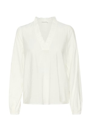 Bela bluzica z dolgimi rokavi z globokim V-izrezom in nabranimi robovi. Mehka tkanina z diskretnim teksturiranim vzorcem. Manšete so nabrite za sproščen videz.