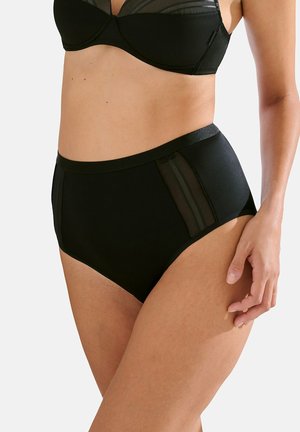 Culotte noire taille haute avec des accents de panneaux transparents sur les côtés, texture lisse et ceinture élastique solide.