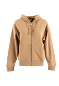 Hoodie zippé beige en tissu doux, doté d'une capuche avec cordon de serrage, de poches avant et d'une subtile broderie de logo sur la poitrine.